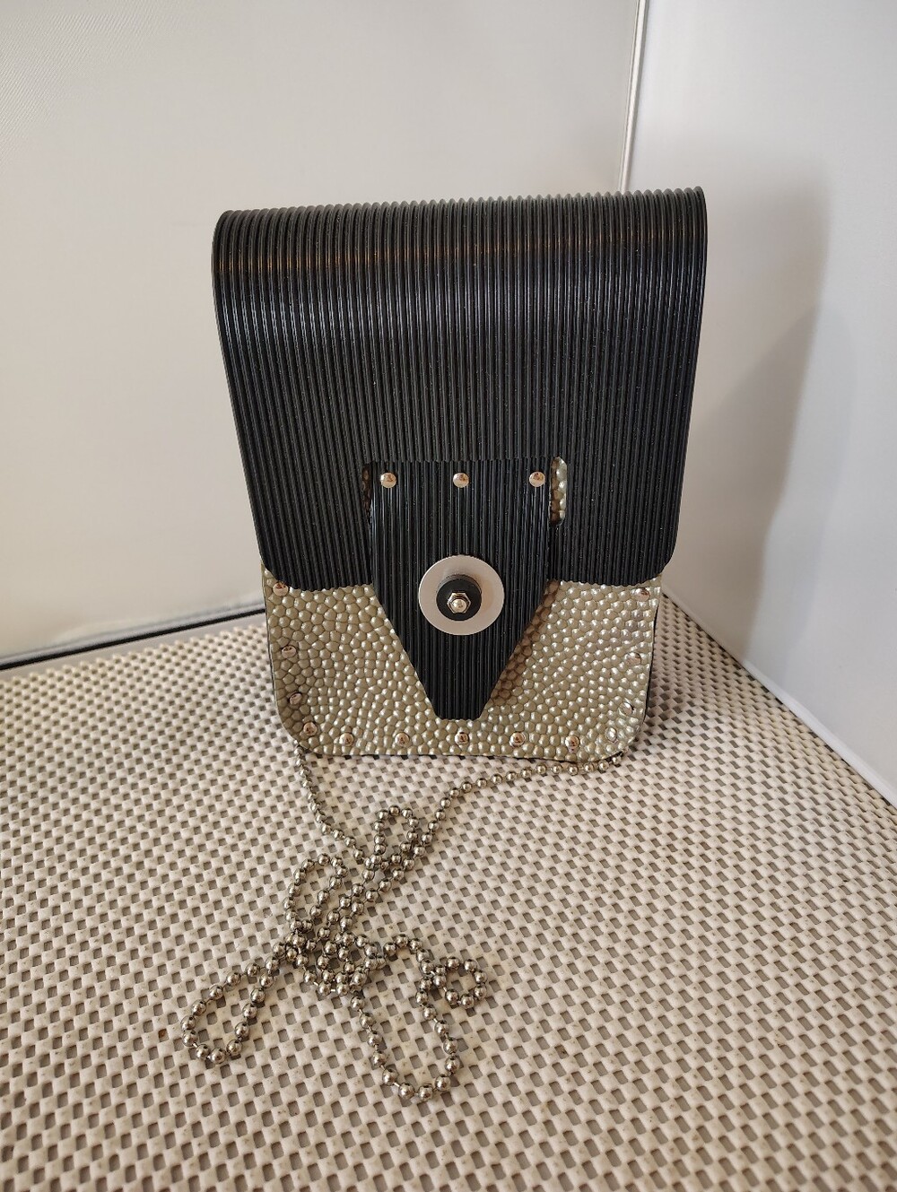 Rubber crossbody bag with silver beaded detail